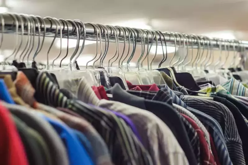 shirts on a thrift store rack