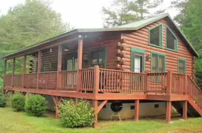 cabin in the woods with a deck