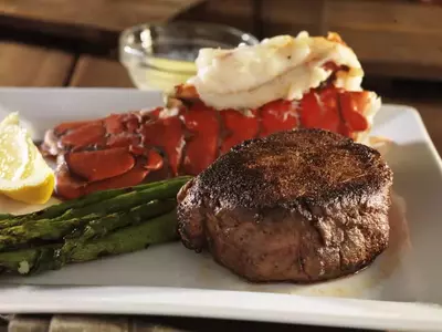 steak and lobster tail on plate