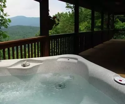 The hot tub on deck of the Soaring Eagle cabin in Murphy NC.