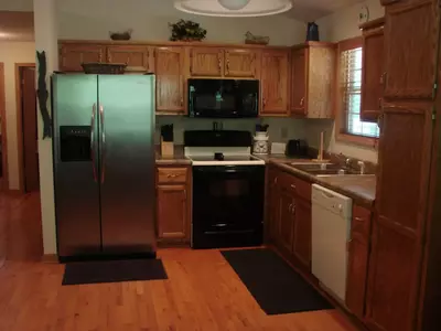 The fully equipped kitchen in a cabin rental in Murphy North Carolina.