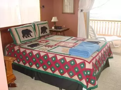 Bedroom in Mountain Top retreat, one of the best Murphy North Carolina cabin rentals.