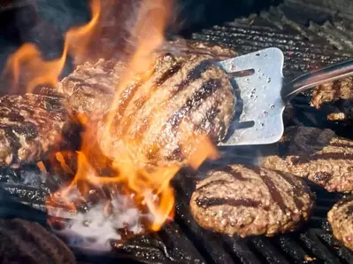 Burgers on the gas grill at a 2 bedroom North Carolina cabin rental.