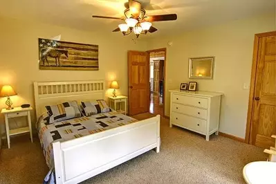 The bedroom of a lovely cabin in Murphy North Carolina.