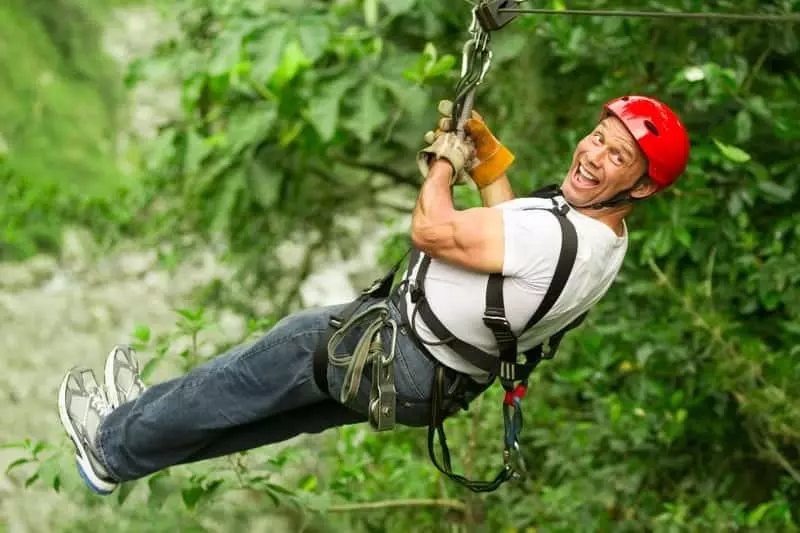 happy man on a zipline